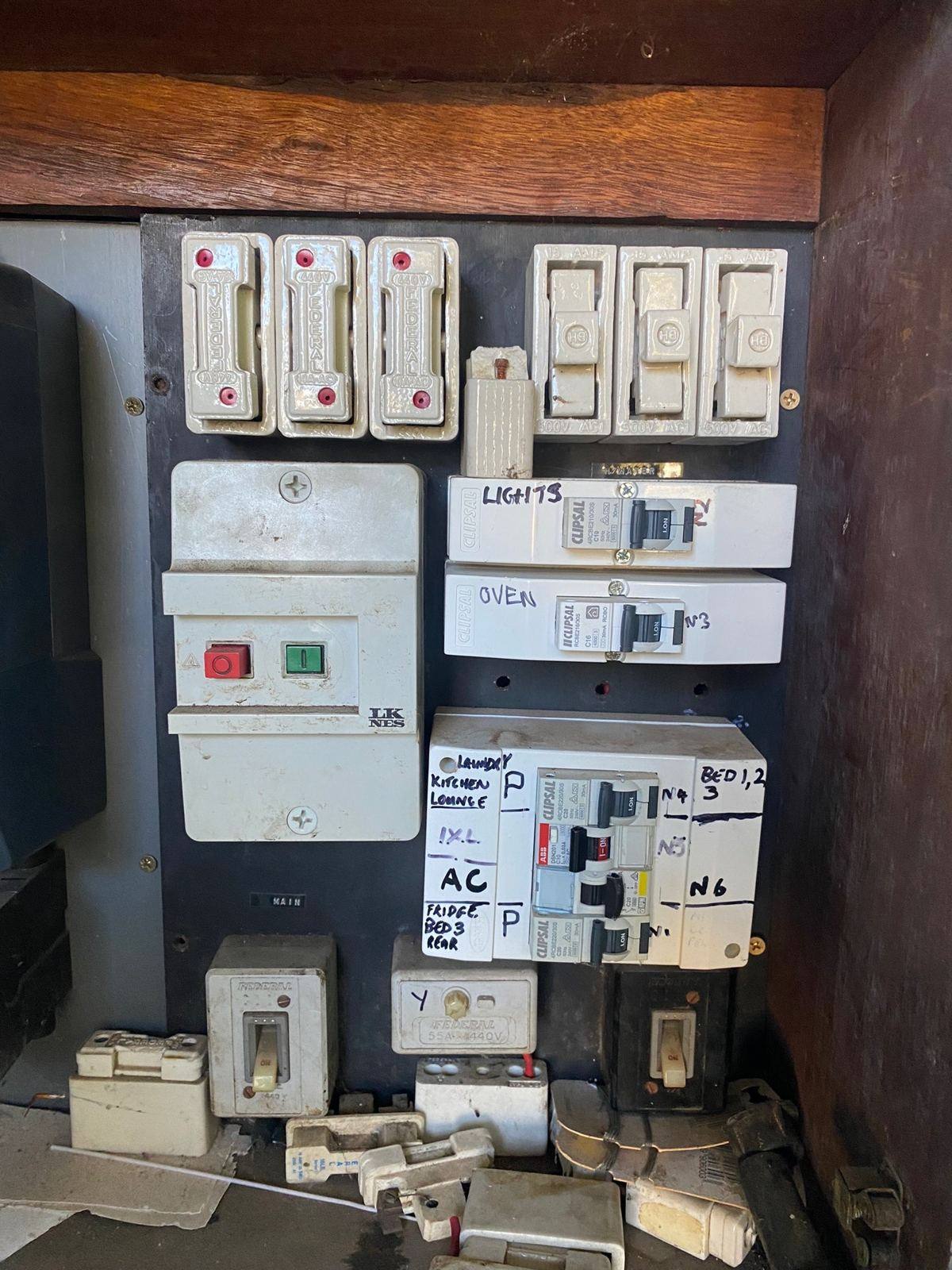Old ceramic fuse switchboard found in a Perth home, Buetec Electrical callout
